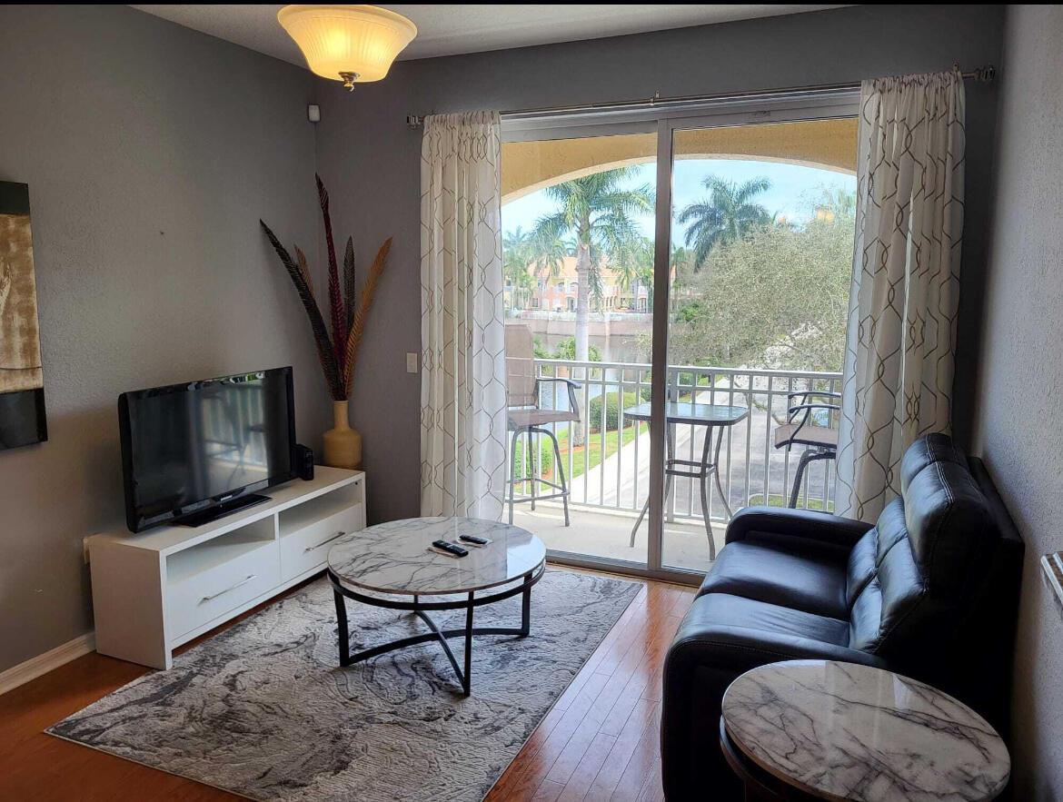 ***PALM BEACH GARDENS*** LEGACY PLACE LUXURY. CONDO FOR RENT WITH STUNNING VIEW******ALL UTILITIES INCLUDED IN RENT*****BEST ONE BEDROOM VIEWS AND FLOOR PLAN IN LEGACY PLACE - THIS CONDO HAS UPGRADES AND STUNNING VIEWS OF THE LAKE AND POOL - IT ALSO FEATURES LARGE MASTER BEDROOM WITH WALK-IN CLOSET - OPEN CONCEPT KITCHEN WITH GRANITE COUNTERS - OPEN LIVING/DINING AREA AND NEW IMPACT WINDOWS WITH 8 FT PATIO DOORS - PARKING SPACE DIRECTLY IN FRONT OF UNIT AND INCLUDES WATER ! COMMUNITY AMENITIES INCLUDE POOL, SPA, GAS GRILLS, BBQ AREA, LIT TENNIS COURTS, KIDS PLAY AREA, GYM, BUSINESS CENTER AND SIDEWALKS FOR WALKING.