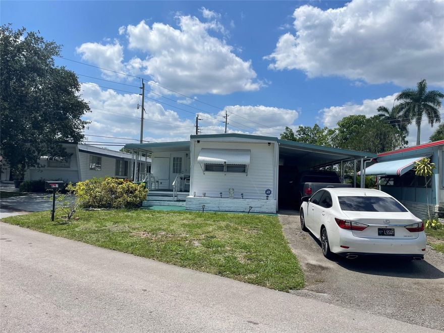 Nice size 3/2 that has the feel of a double wide - split bedroom plan - carport - shed - open porch - needs some TLC - -enough to make it your own - -Central a/c approx. 6 years - -close to clubhouse - -assoc. states it is HOPA verified - -a must see.......