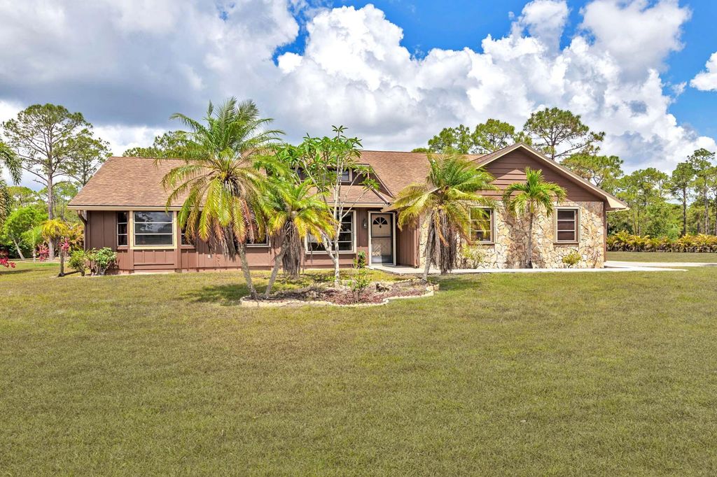 Photo of 14087 Cocoa Plum Road, Palm Beach Gardens, FL 33418 (MLS # R11090733)