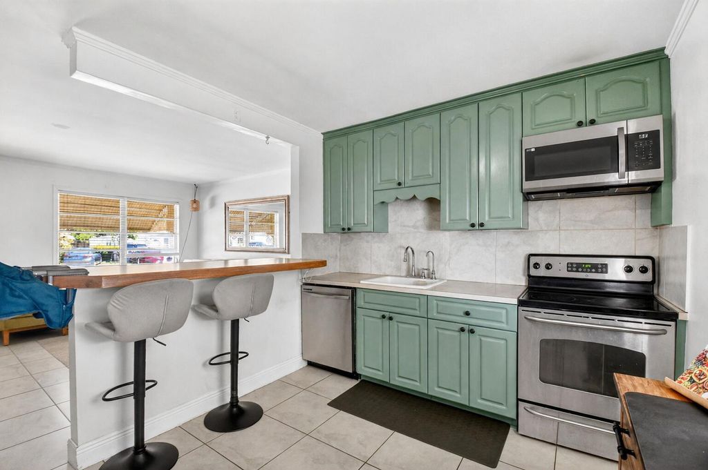 Photo of 3017 Buckley Avenue, Lake Worth, FL 33461 (MLS # B26021708)