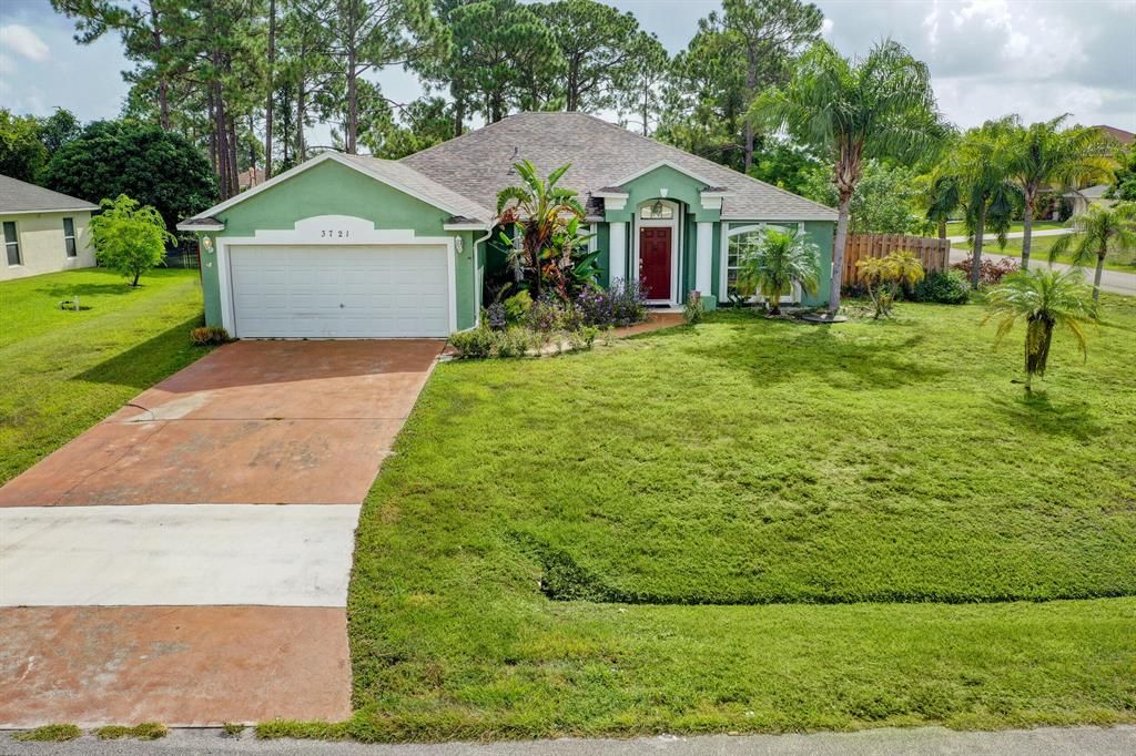 Photo of 3721 SW Masilunas Street St, Port Saint Lucie, FL 34953 (MLS # R10824166)