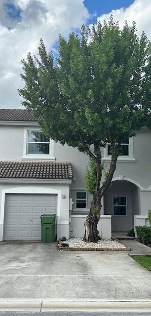 Spotless and beautifully updated 3/2.1/2 townhouse with 1 car garage located in desirable gated community of Pembroke Shores subdivision (Sterling Place) and is surrounded by excellent schools. This property boasts Impact windows and doors, porcelain tiles on the first floor, kitchen with wood cabinets, granite countertops and newer stainless-steel appliances. including the washer and dryer. The AC is just over 2 years old. This Property is centrally located to highways, hospitals, shopping malls great restaurants A schools and much more