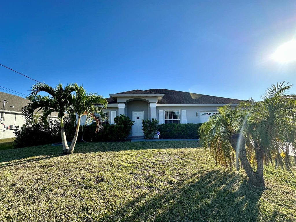 Photo of 466 SE Essex Drive, Port Saint Lucie, FL 34984 (MLS # R10977775)