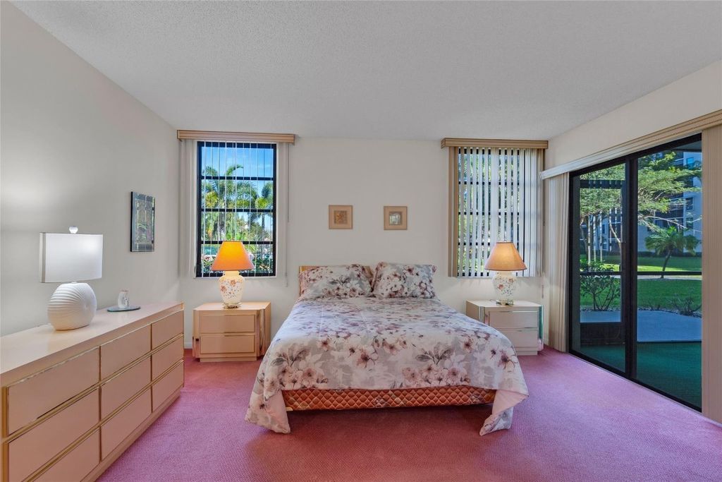 Photo of 2205 S Cypress Bend Drive #104, Pompano Beach, FL 33069 (MLS # F10488583)