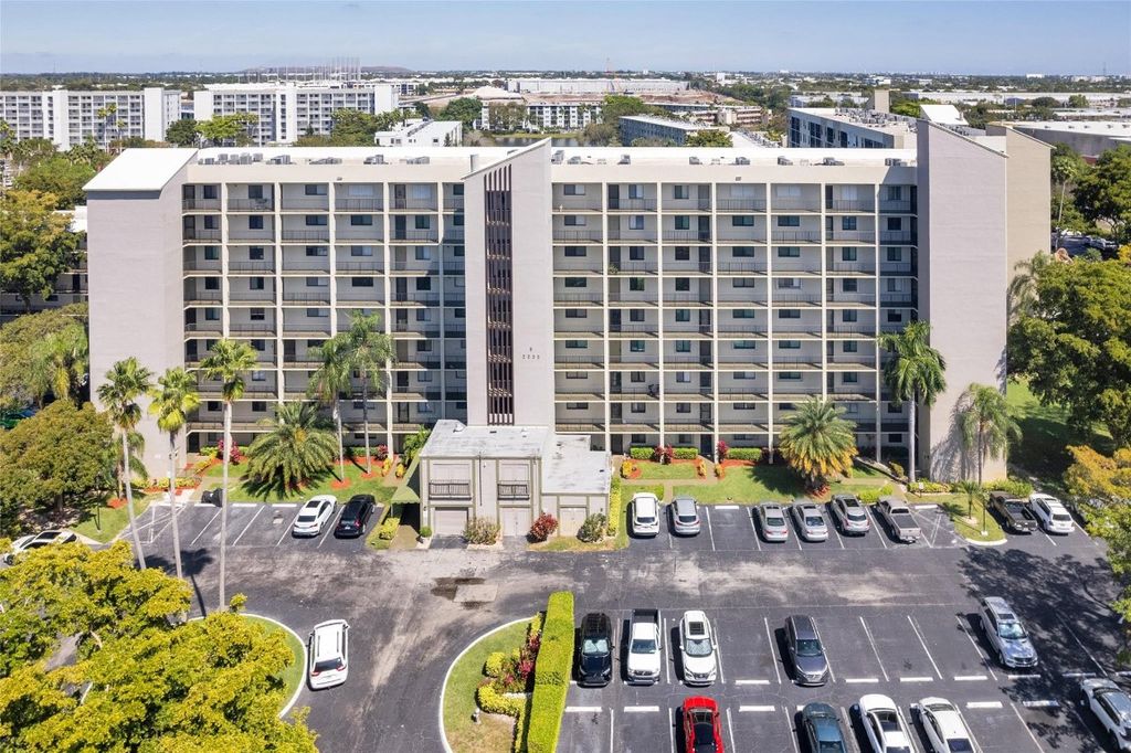 Photo of 2205 S Cypress Bend Drive #104, Pompano Beach, FL 33069 (MLS # F10488583)