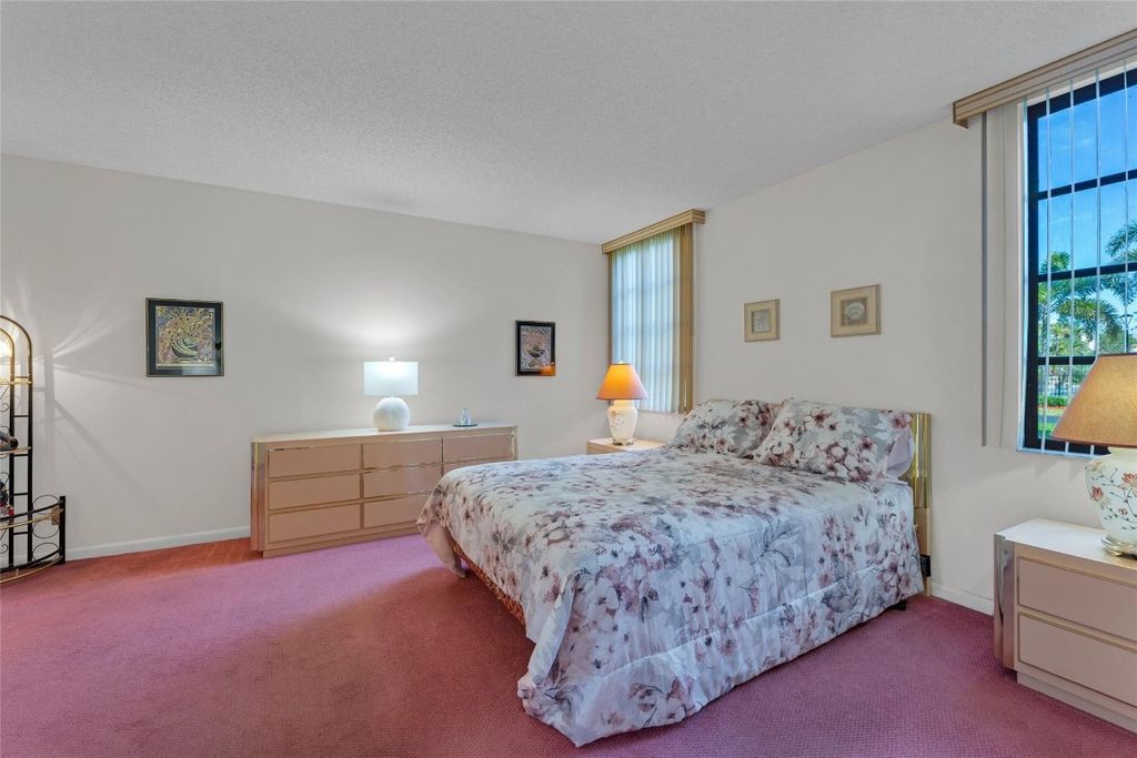 Photo of 2205 S Cypress Bend Drive #104, Pompano Beach, FL 33069 (MLS # F10488583)