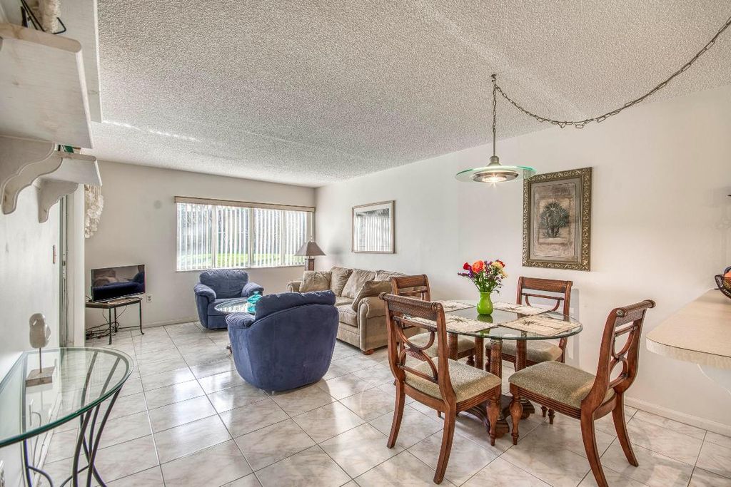 Photo of 830 SW 9th Street Circle #104, Boca Raton, FL 33486 (MLS # R11154596)