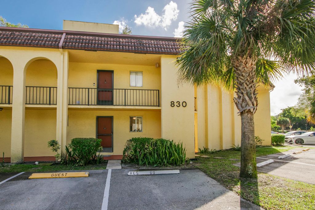 Photo of 830 SW 9th Street Circle #104, Boca Raton, FL 33486 (MLS # R11154596)
