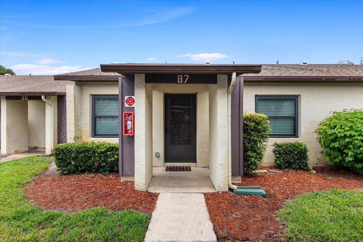 Looking for the perfect 2 bed / 2 bath condo in a gated community with a heated POOL?! This is it! This adorable condo/villa features a spacious living room with a bar counter, new kitchen appliances, 2024 AC, 2024 in-unit washer and dryer, AND a screened patio! Vinyl flooring throughout and fresh paint! This unit comes with 1 assigned covered parking spot which is located DIRECTLY in front of the unit, very convenient when it's raining! There is a private gated and locked storage lot in the community for boat and/or RV storage if needed.