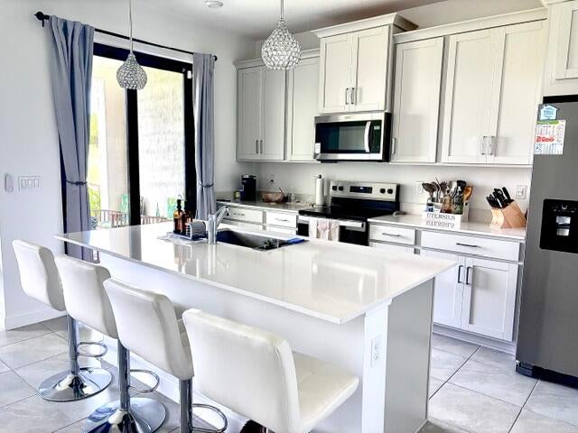 Photo of 14043 SW THORENS Drive, Port Saint Lucie, FL 34987 (MLS # B26055556)