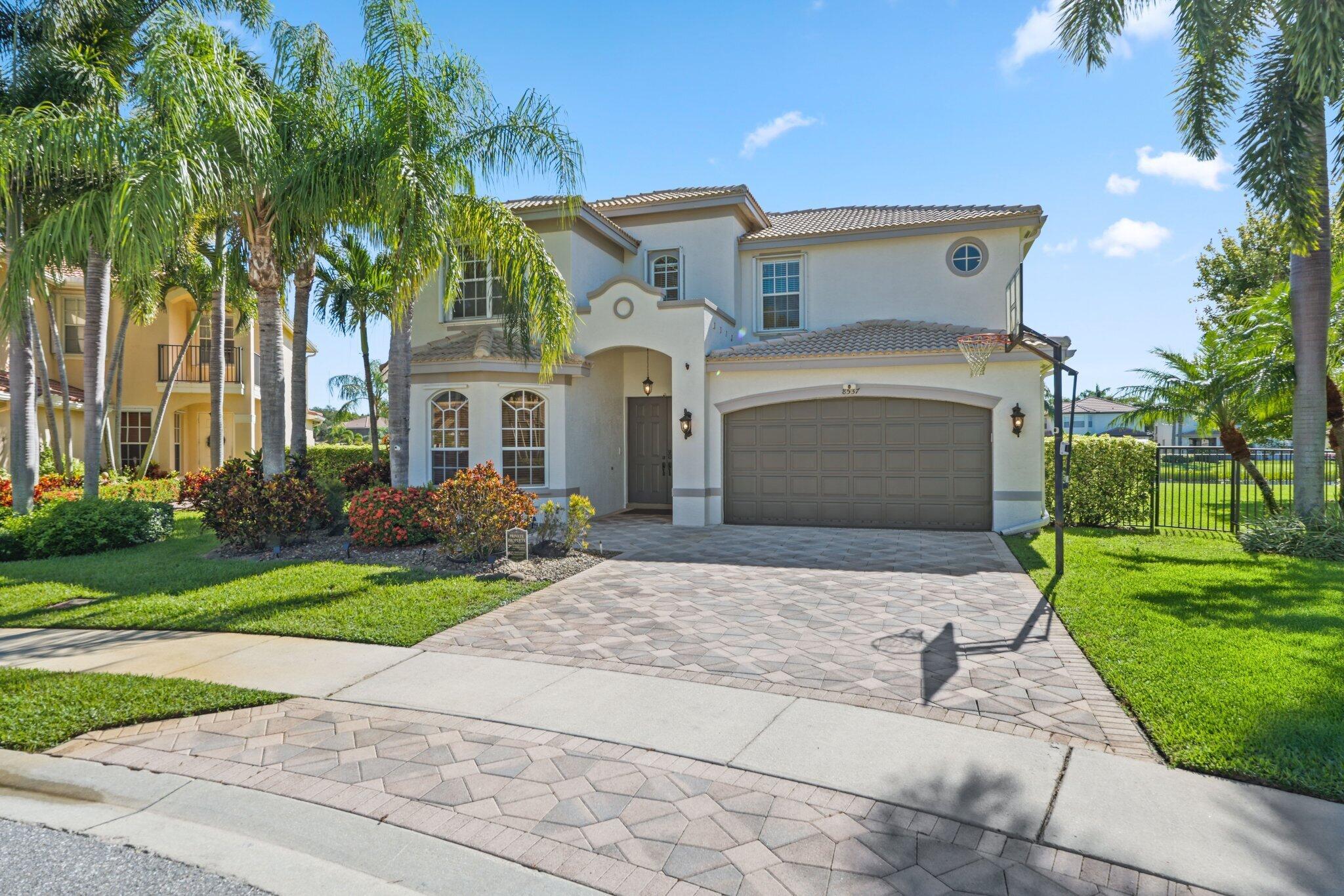Welcome to the stunning Amethyst model in the highly sought-after Canyon Isles community!This 5-bedroom, 4-bathroom home with a loft is perfectly situated on a cul-de-sac lot with stunning sought-after lake views on a rare pie-shaped lot featuring an extra-large green space for outdoor activities and entertaining, offering both privacy and luxury.The backyard is an entertainer's dream, featuring a heated resurfaced pool with sun shelf, infinity-edge Jacuzzi with freshwater system, and custom landscaping for added seclusion.