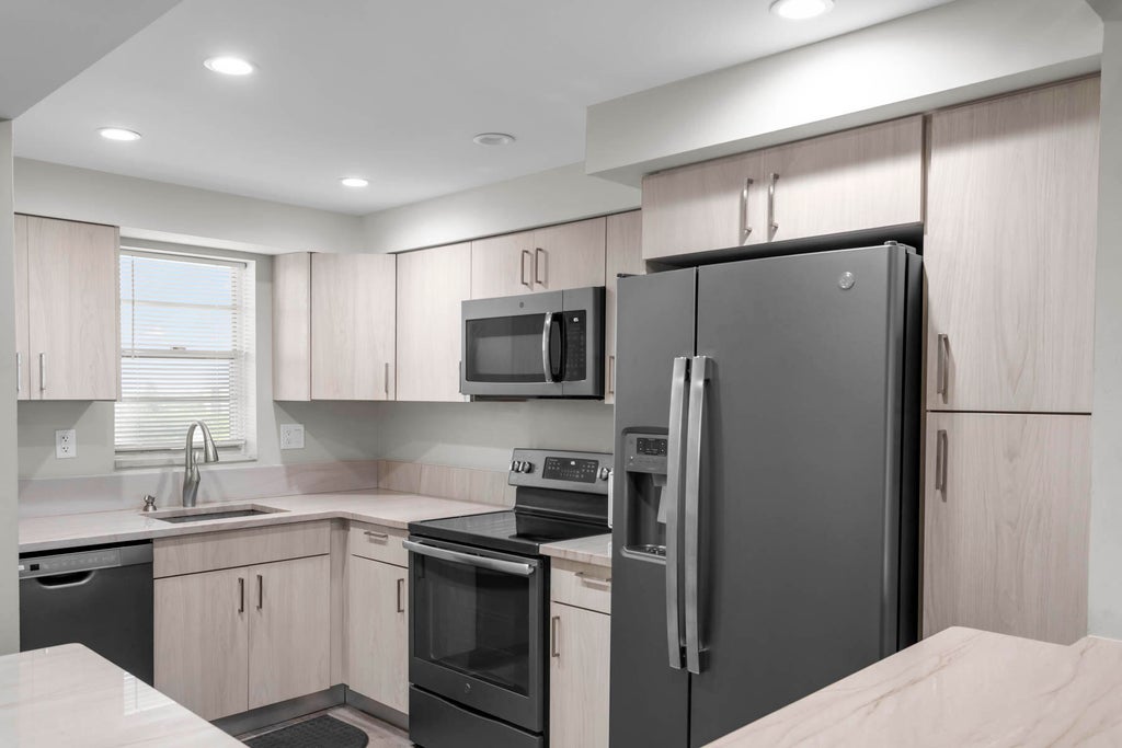 Photo of 3150 W Rolling Hills Circle #704, Davie, FL 33328 (MLS # B26047279)