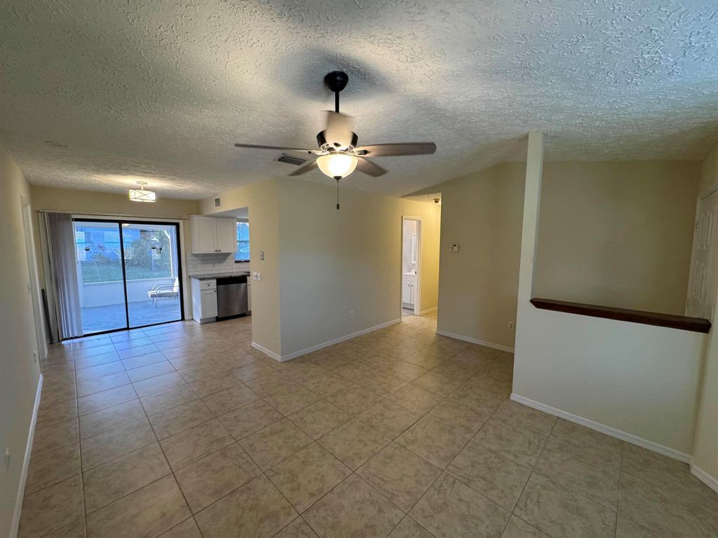 Photo of 2250 SW Pamona Street, Port Saint Lucie, FL 34953 (MLS # R11048083)