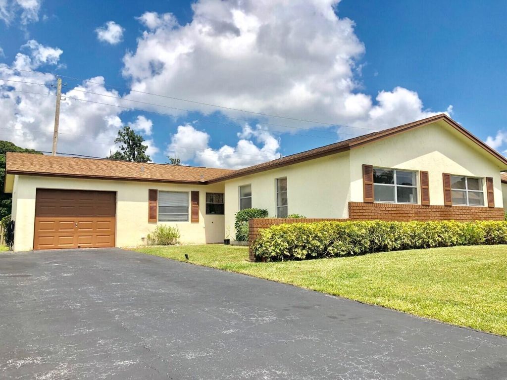 Photo of 6101 Rainbow Circle, Greenacres, FL 33463 (MLS # R11096596)