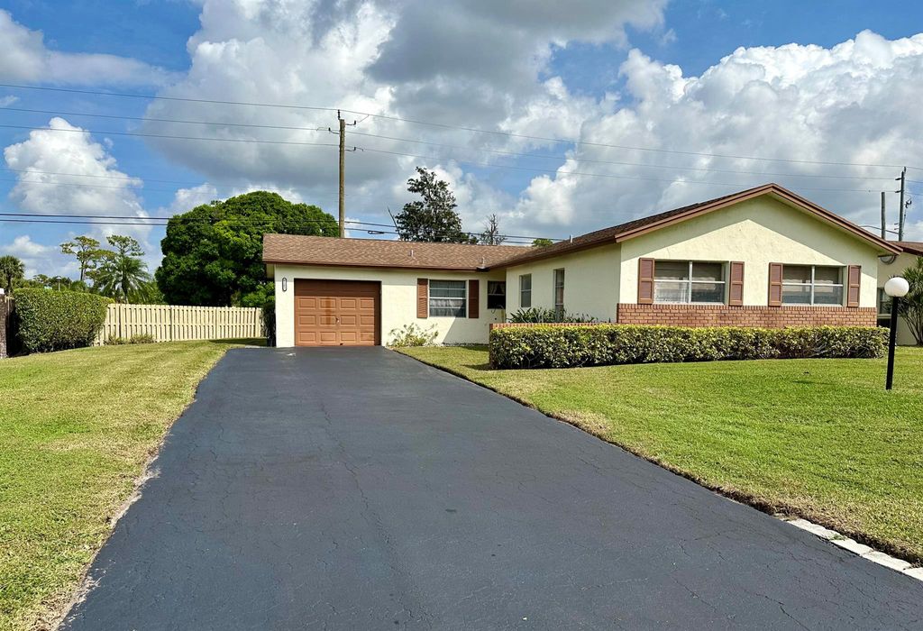 Photo of 6101 Rainbow Circle, Greenacres, FL 33463 (MLS # R11096596)