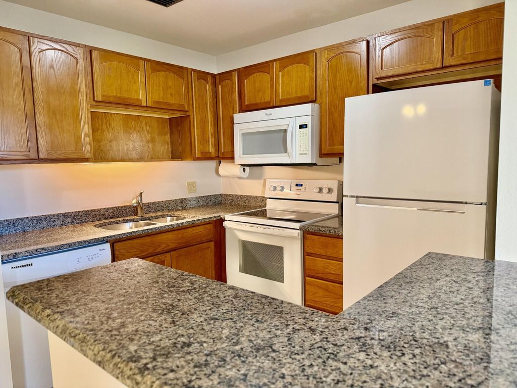 Photo of 7 Lake Vista Trail #104, Port Saint Lucie, FL 34952 (MLS # R11159577)