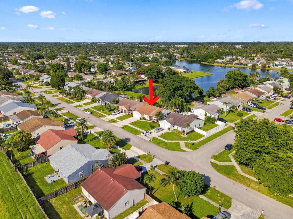 Photo of 5215 W Canal Circle, Lake Worth, FL 33467 (MLS # B26076512)