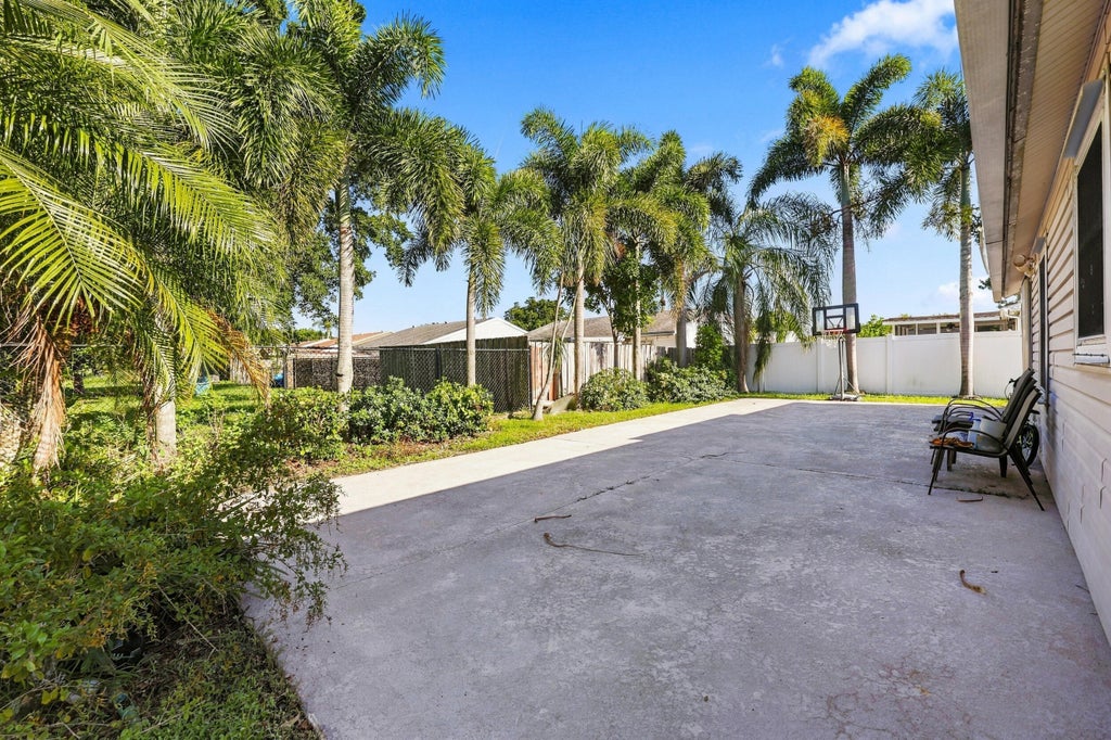 Photo of 5215 W Canal Circle, Lake Worth, FL 33467 (MLS # B26076512)