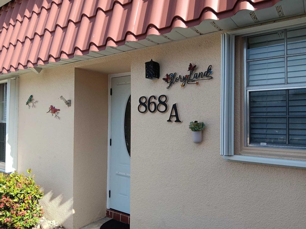 Photo of 868 Worcester LN #A, Lake Worth, FL 33467 (MLS # B26083538)