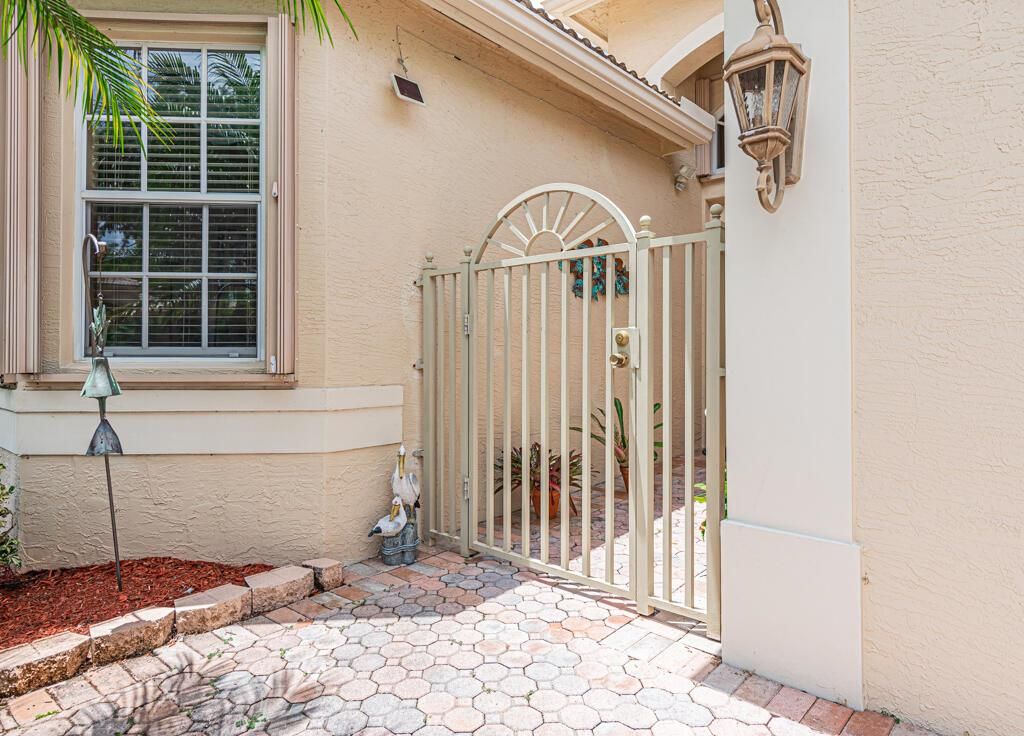 Photo of 8225 La Jolla Vista Lane Ln, Lake Worth Beach, FL 33467 (MLS # R10719659)