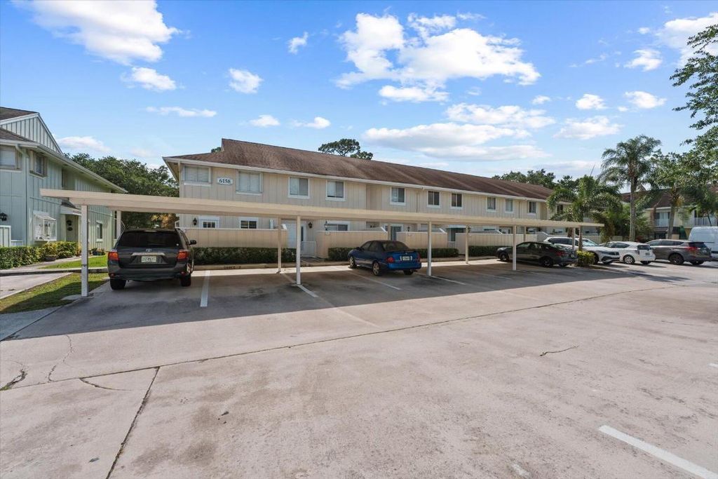 Photo of 6158 Riverwalk Lane #6, Jupiter, FL 33458 (MLS # R10977538)
