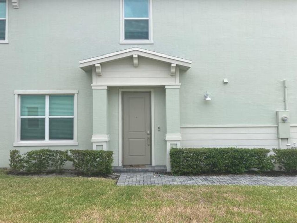 Photo of 229 SE Woodbark Street, Port Saint Lucie, FL 34984 (MLS # B26024887)