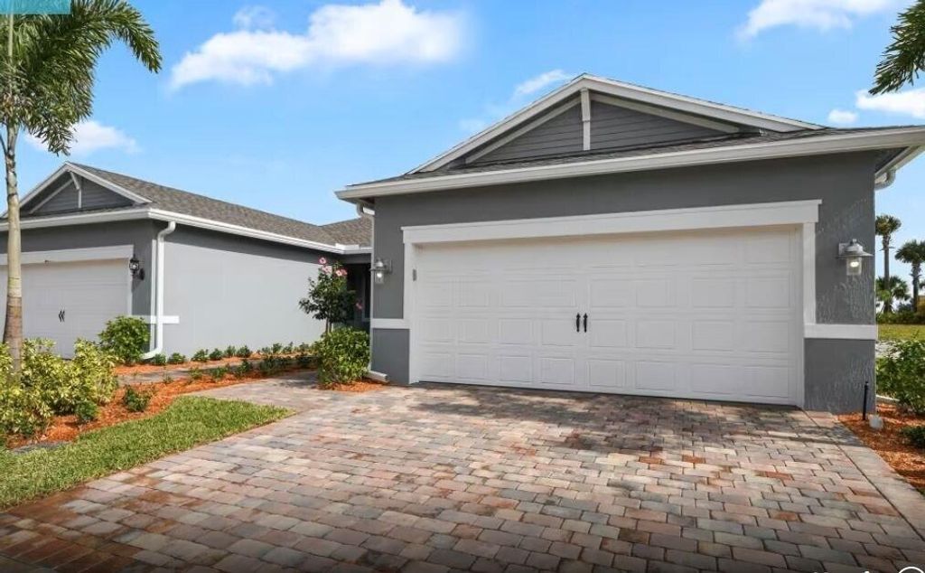 Photo of 12821 SW Cattleya Lane #Villa 214, Port Saint Lucie, FL 34987 (MLS # B26015408)