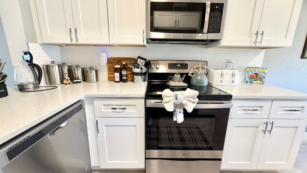 Photo of 4692 Lucerne Lakes Boulevard E #103, Greenacres, FL 33467 (MLS # B26016363)