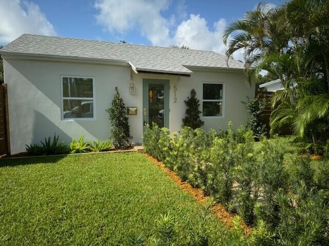 Fully Renovated single family home located 2 blocks off the intracoastal in the historic neighborhood of Northwood Harbor that is experiencing significant development growth. Main house features 2 bedrooms, 1 bath, with central a/c and utility closet. Detached studio apartment with 1 bath, full kitchen and mini split. Both units are fully permitted with brand new plumbing, electrical, stucco; impact windows and doors. Featuring recessed lighting, quartz countertops, stainless steel appliances, professionally landscaped grounds with new sod and underground sprinkler system. Fenced backyard with space for a pool. Some of the planned and approved developments just minutes away include: Alba, Olara, The Ritz Carlton. Beautiful rental property with flexible terms.