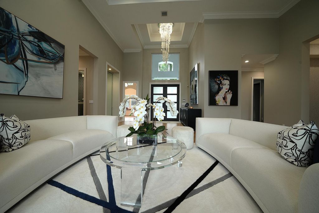 Photo of 61 Peregrine Avenue, Plantation, FL 33324 (MLS # B26004655)