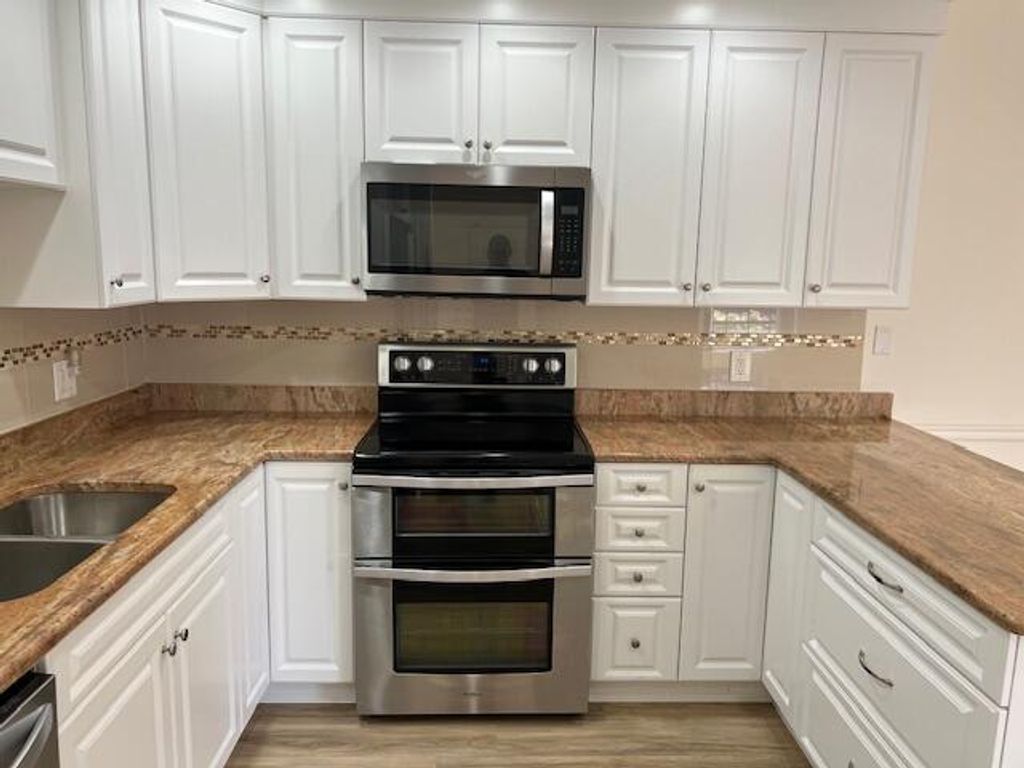 Photo of 1457 Captains Walk #30a, Fort Pierce, FL 34950 (MLS # R10957666)