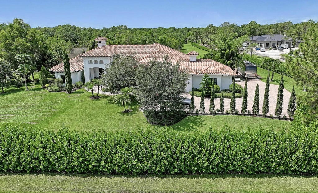 Photo of 18900 SE Crosswinds Lane, Jupiter, FL 33478 (MLS # B26088781)