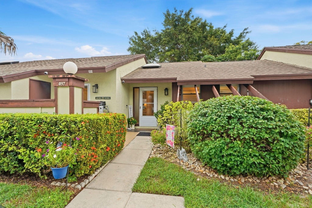 Photo of 497 Iron Forge Court, Royal Palm Beach, FL 33411 (MLS # B26080478)