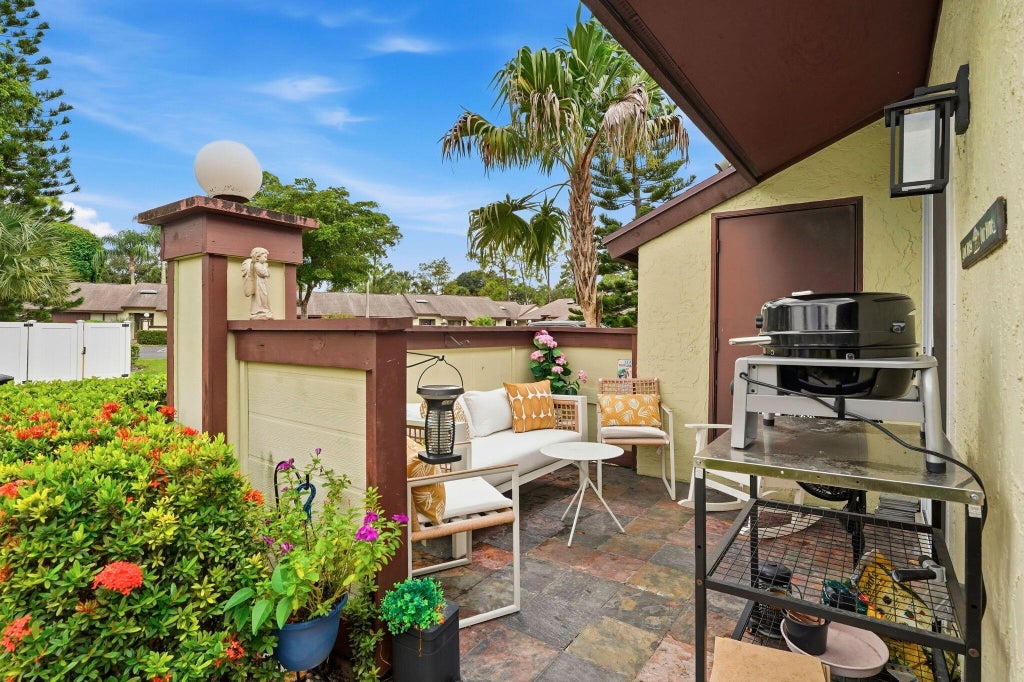 Photo of 497 Iron Forge Court, Royal Palm Beach, FL 33411 (MLS # B26080478)