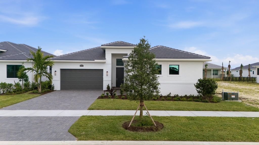 Photo of 12678 SW Lunata Way, Port Saint Lucie, FL 34987 (MLS # B26018371)