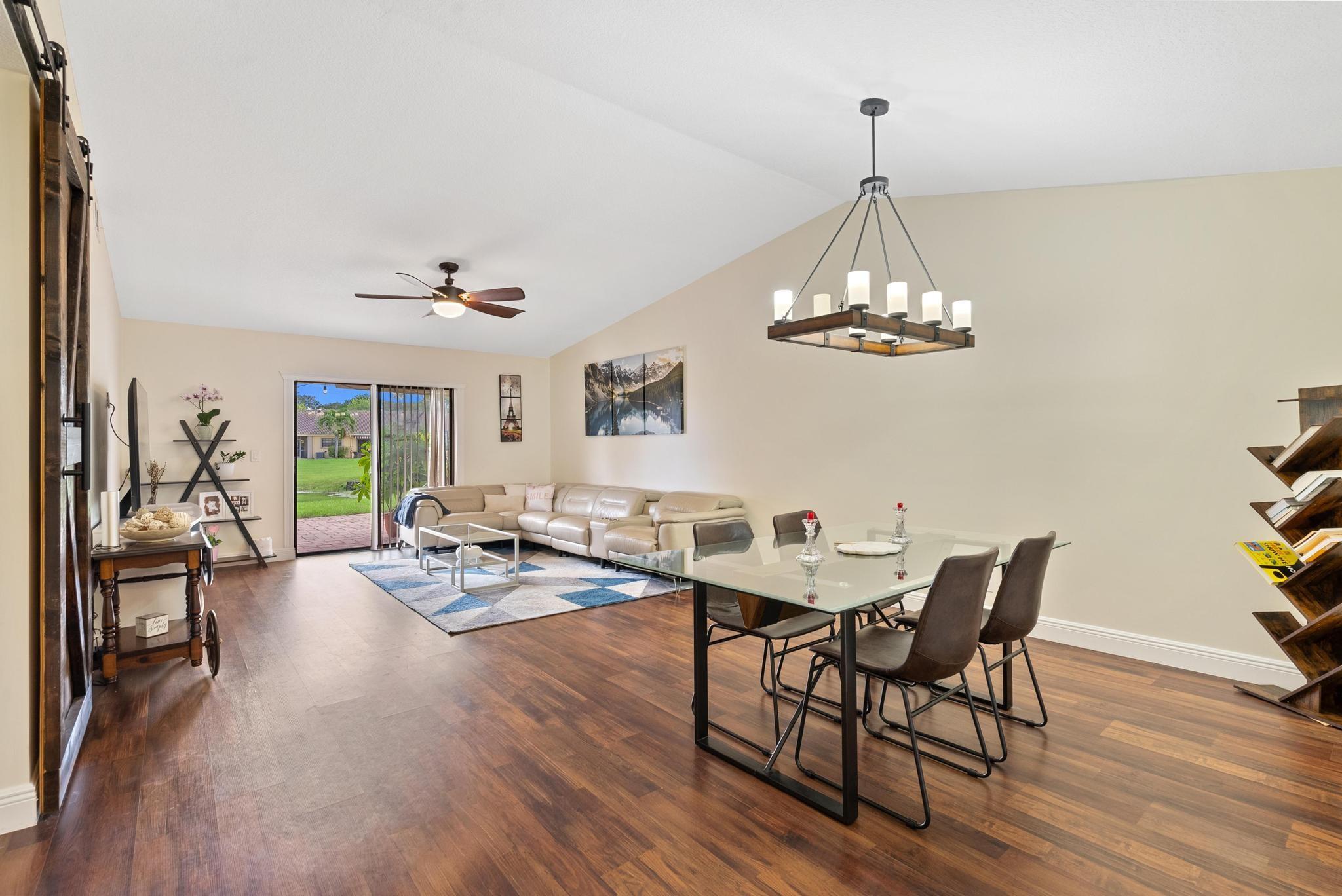 WELCOME HOME! Completely remodeled Villa with 2bd/2ba+DEN in the heart of Boca Raton. Property features an open & very spacious floor plan, high ceilings, updated kitchen with granite countertops & SS Appliances, updated bathrooms, new guest bathroom, neutral tile & wood floors, NO popcorn ceiling, modern lighting fixtures, AC 2021, large laundry room with full size W&D & full hurricane protection. PRIVATE EV CHARGER outside. Property has 2 patios, one paved in the front with new fence & one very spacious paved patio in the back w/ a wonderful lake view. Amazing location by the pool, walking distance to places of worship, A+ rated schools, shopping, dining, entertainment & highways. Thornhill Lake is a pet friendly community. Min. 720 credit score required for at least 1 occupant. MUST SEE