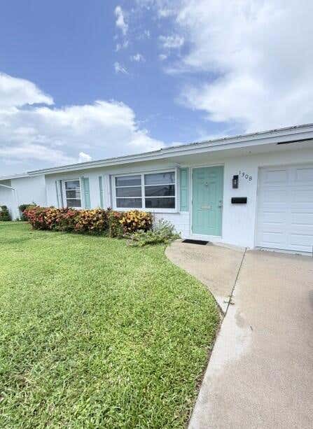 Photo of 1308 SW 24th Street, Boynton Beach, FL 33426 (MLS # B26048875)