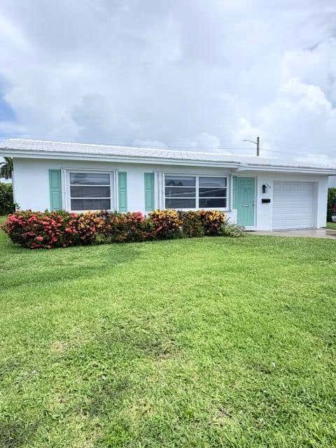 Photo of 1308 SW 24th Street, Boynton Beach, FL 33426 (MLS # B26048875)