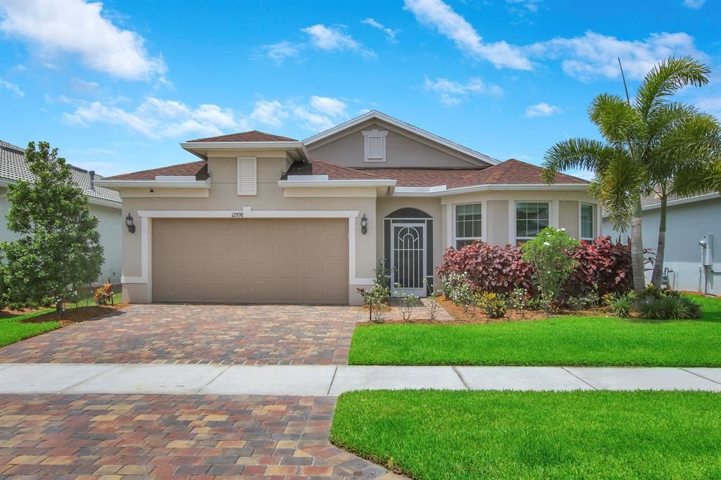 Photo of 12998 SW Gingerline Drive, Port Saint Lucie, FL 34987 (MLS # R10802373)