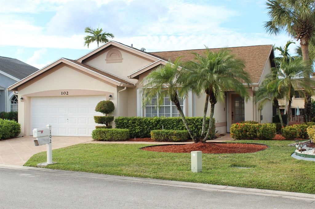 Photo of 102 Hammocks Court, West Palm Beach, FL 33413 (MLS # R10777037)