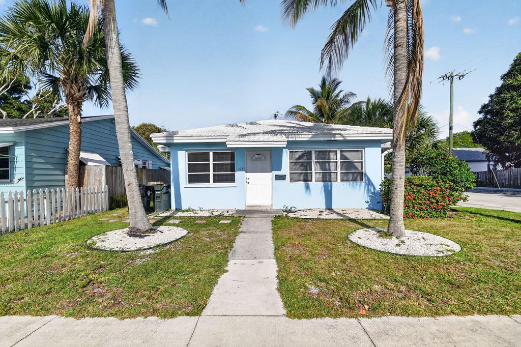 Photo of 303 S L Street, Lake Worth Beach, FL 33460 (MLS # B26026573)