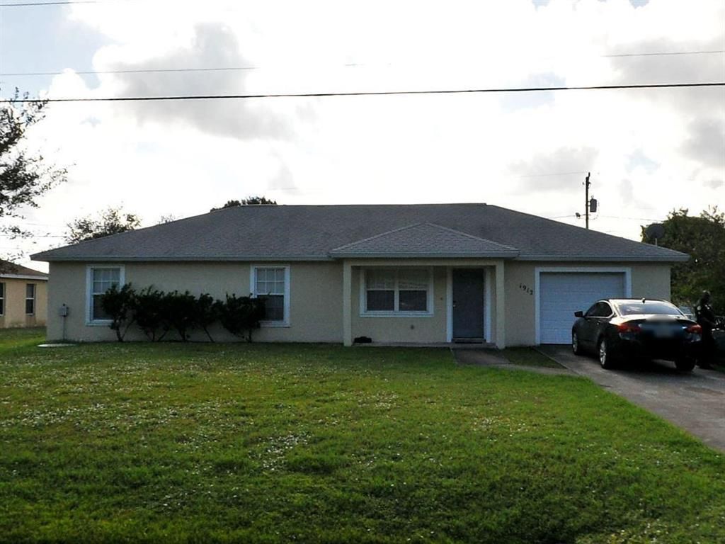 Photo of 1912 SE Berkshire Boulevard, Port St Lucie, FL 34952 (MLS # R10873250)