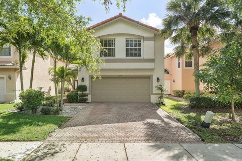 Photo of 5218 Rising Comet Lane, Greenacres, FL 33463 (MLS # B26014327)