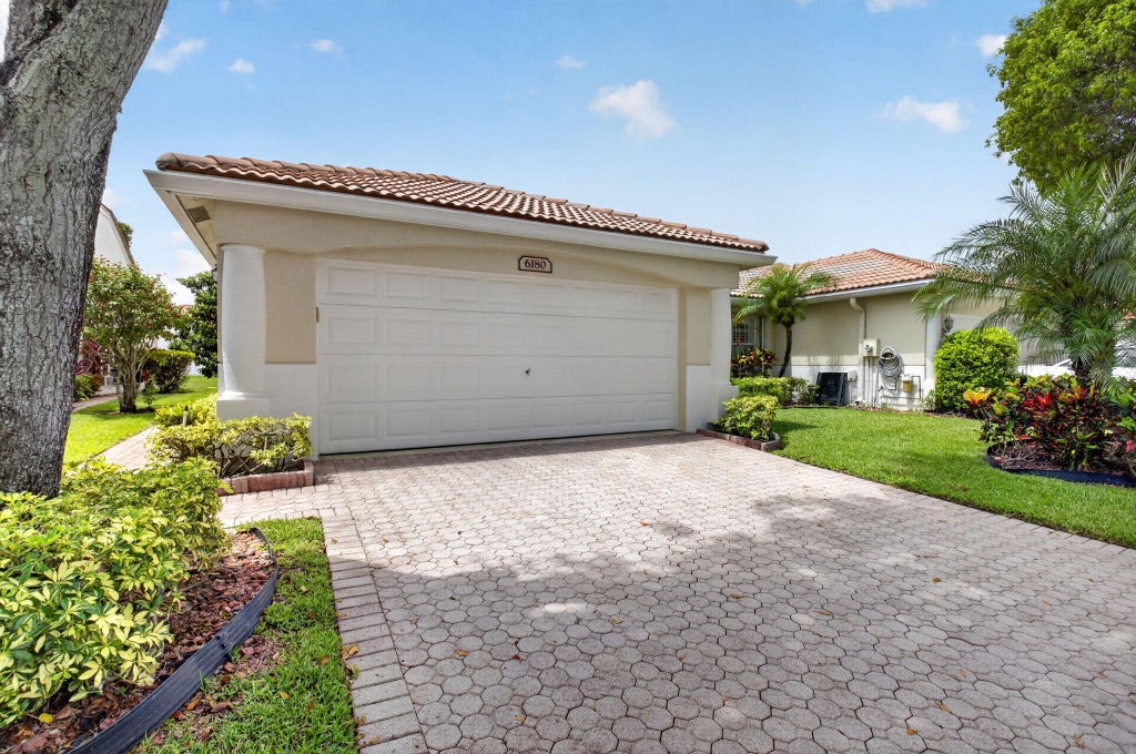 Photo of 6180 Caladium Road, Delray Beach, FL 33484 (MLS # B26036361)