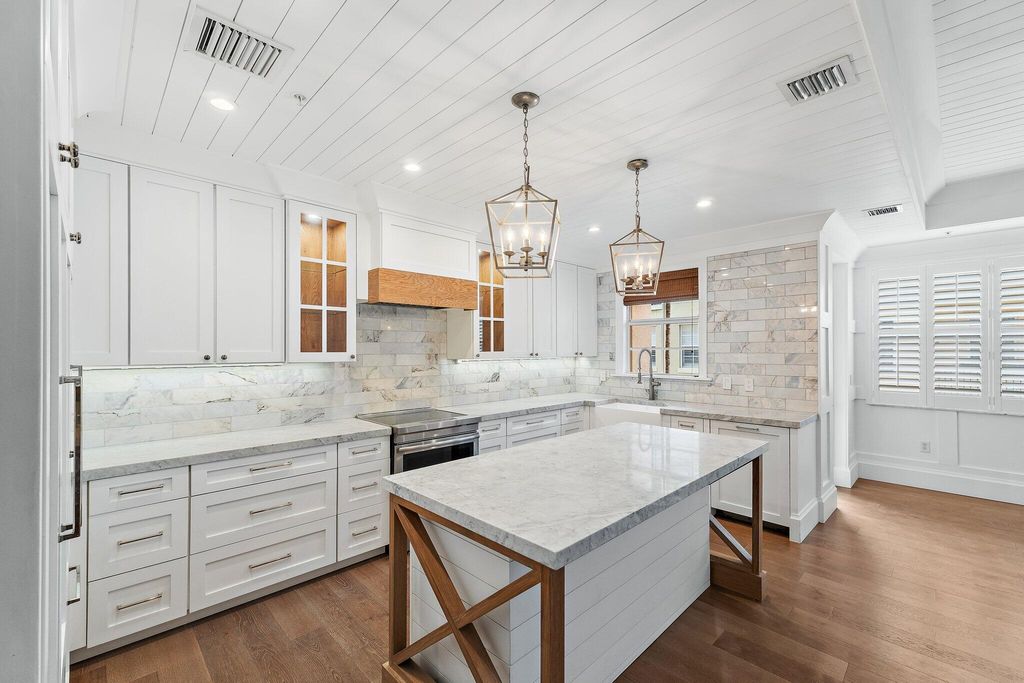 Photo of 2715 Ravella Way, Palm Beach Gardens, FL 33410 (MLS # B26015611)