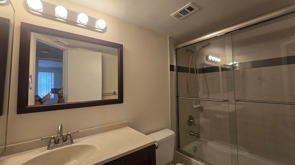 Photo of 8871 Wiles Road #202, Coral Springs, FL 33067 (MLS # F10527245)