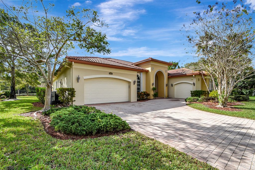 Photo of 8123 Woodslanding Trail, West Palm Beach, FL 33411 (MLS # R11120871)
