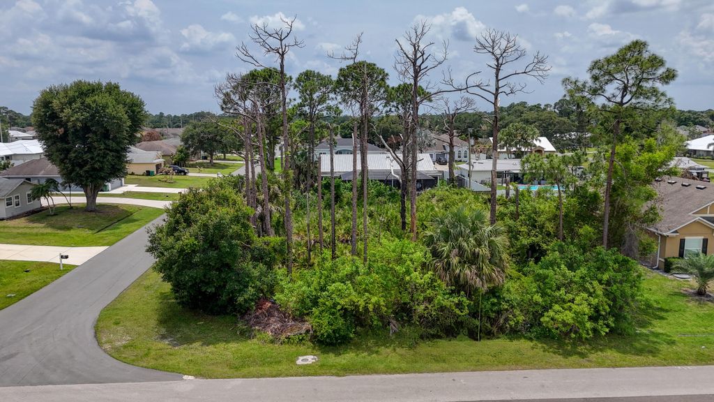 Photo of 1802 SW Diamond Street, Port Saint Lucie, FL 34953 (MLS # B26027181)
