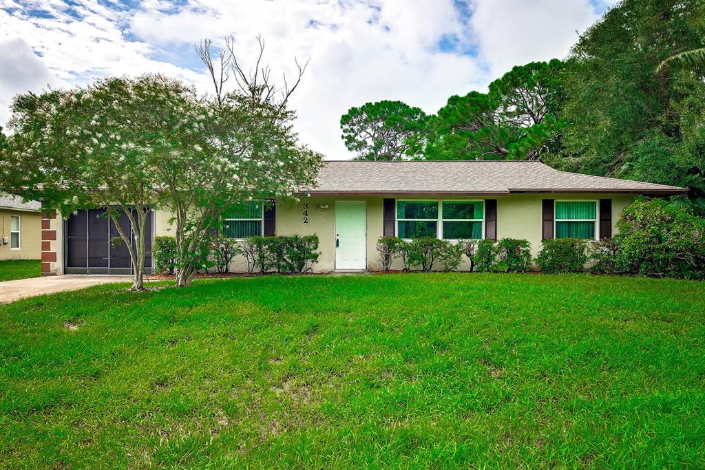 Well located near Crosstown Parkway, this three bedroom two bath home is ready for your design. Great layout with split bedrooms, and a great room open concept. Large pool sized lot. Both baths are beautifully updated. The remainder is ready for your design. Needs fooring throughout and counters added in kitchen but has beautiful new wood cabinets. The windows are impact glass. So much potential here, come check it out. Could be just the one for you to make your own.