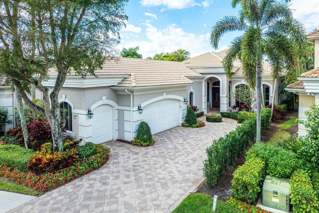 Photo of 117 Island Cove Way, Palm Beach Gardens, FL 33418 (MLS # R10957165)